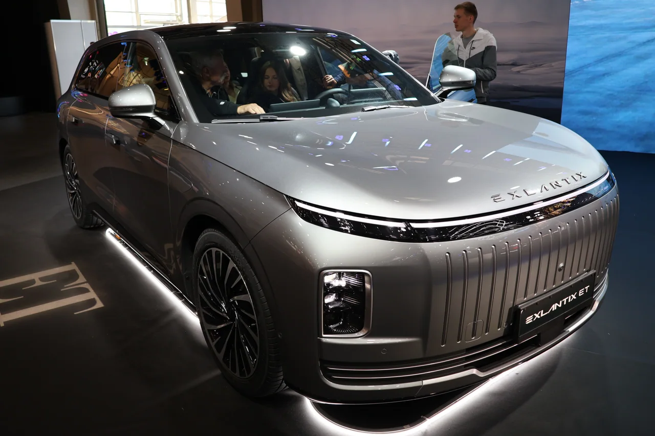 Silver Exlantix ET displayed at Poznań Motor Show 2026, photographed from the front three-quarter angle. It is not the Shanghai event display or an Australian-specification vehicle.