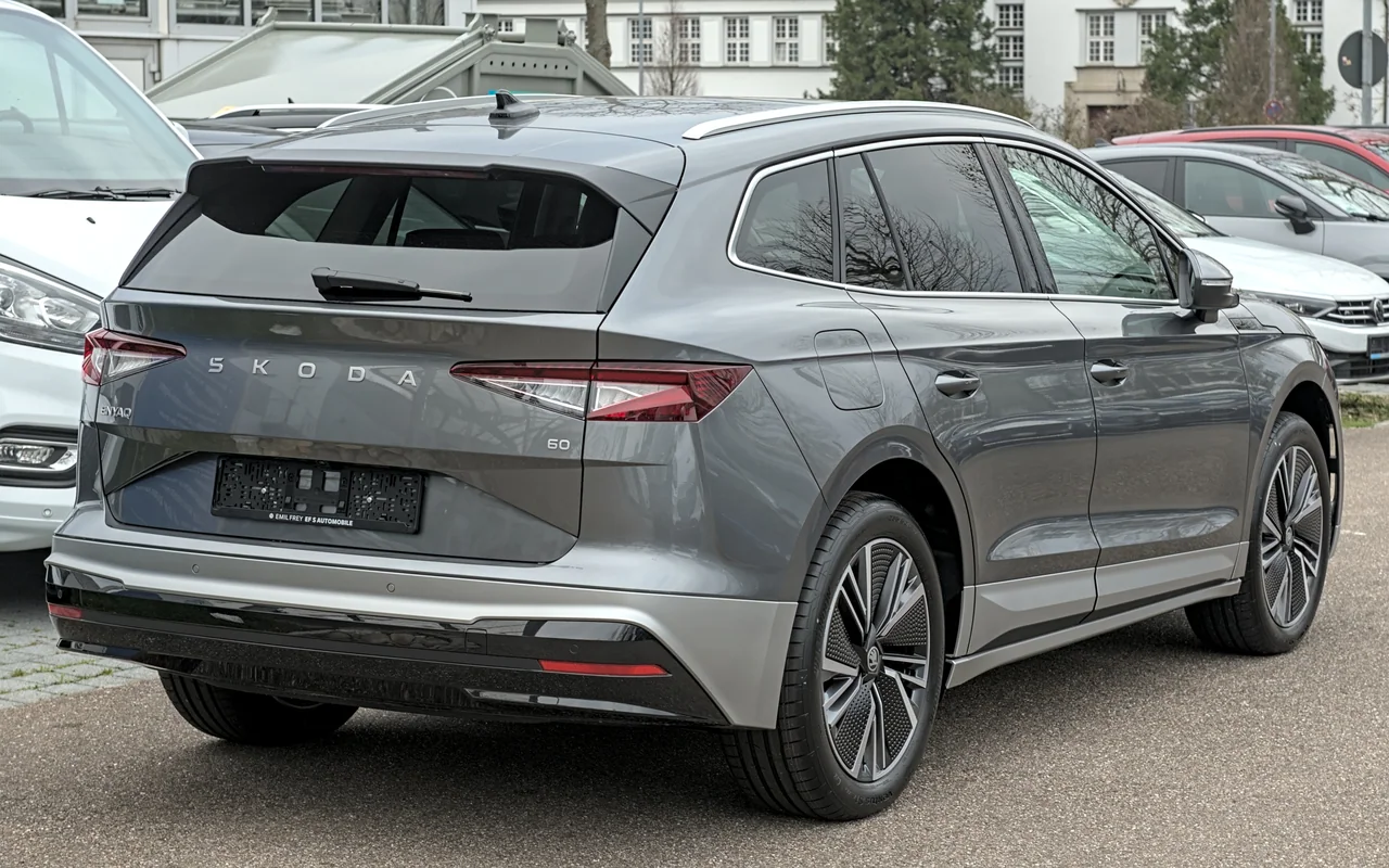 Rear three-quarter view of a grey Škoda Enyaq photographed in Esslingen, Germany.