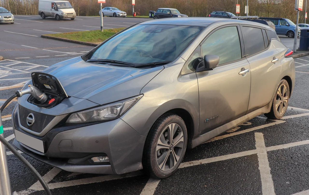 An archival Nissan Leaf plugged into a charging point at Shifnal, Shropshire, in February 2019.